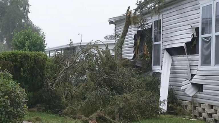 A mobile home with moderate damage